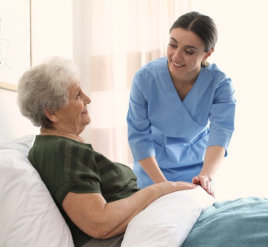 a caregiver woman taking care of an elderly woman