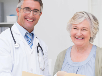 doctor smiling elderly woman